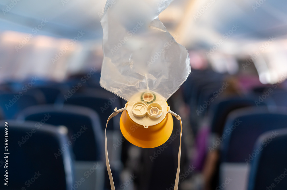 oxygen mask drop from the ceiling compartment on airplane.. ภาพถ่าย ...
