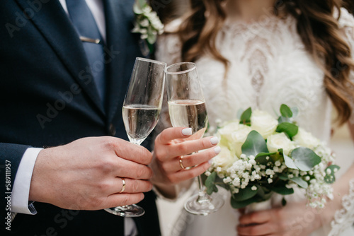 Classic champagne glasses on a wedding background