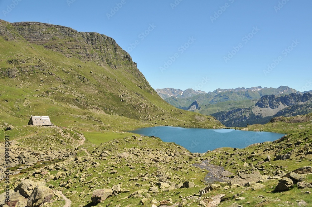 Fototapeta premium Natural view of a calm lake and mountain landscape in the countryside