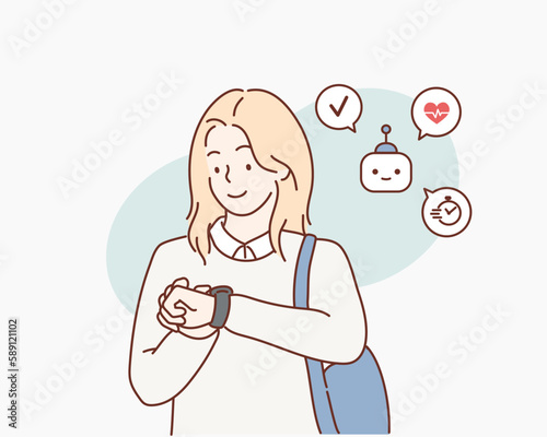 Young woman looks at smart watch. Cute girl wears sports device on her hand. Hand drawn style vector design illustrations.