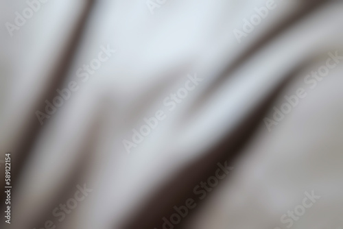 gray surface is smooth and soft with wavy gradients.