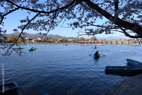 A scene of Togetsu-kyo Bridge and Hozu-gawa River at Arashiyama in Kyoto City in Japan                                                                