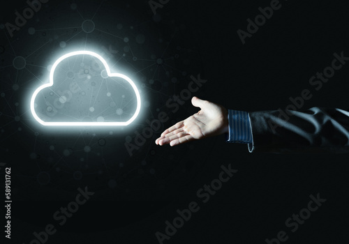 Digital cloud icon as symbol of wireless connection on dark background