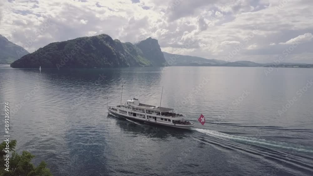 Aerial view of a tourist sailing on the lake of Lake Lucerne in Switzerland Aerial view of a tourist sailing on the lake of Lake Lucerne in Switzerland