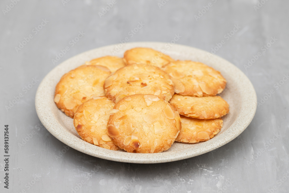 Few homemade cookies with almond on small dish