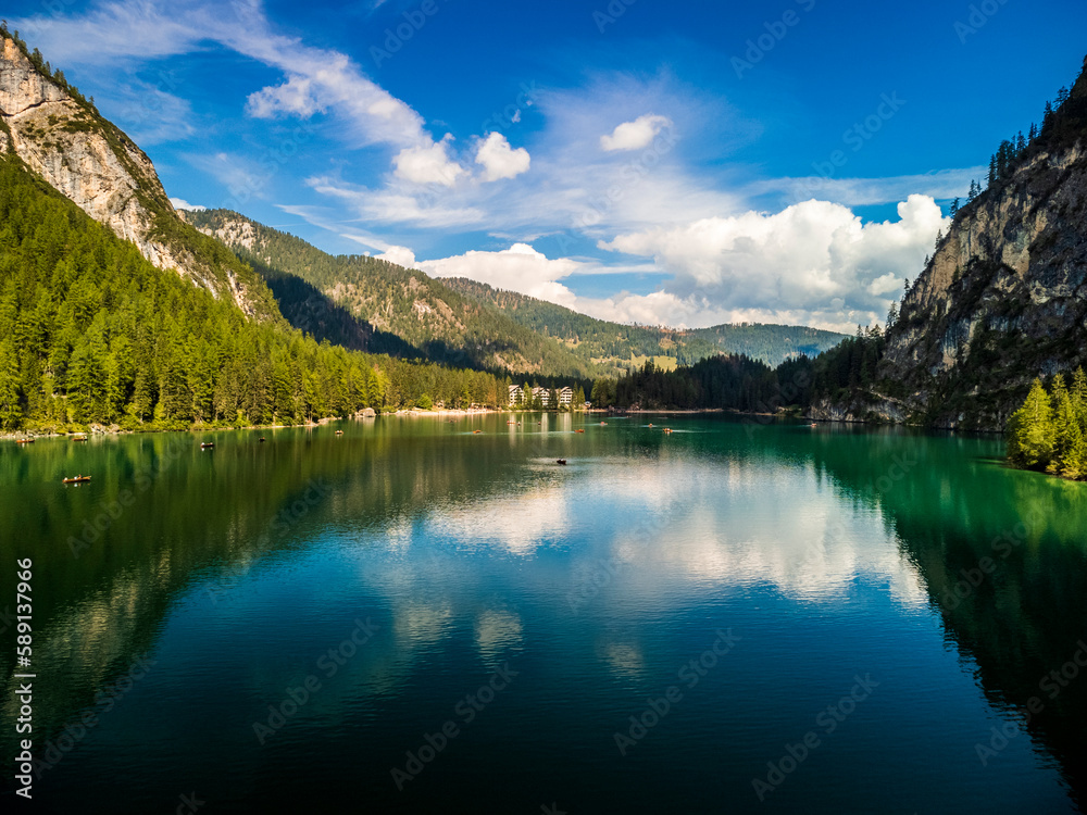 Autumn colors and reflections on Lake Braies and its valley.