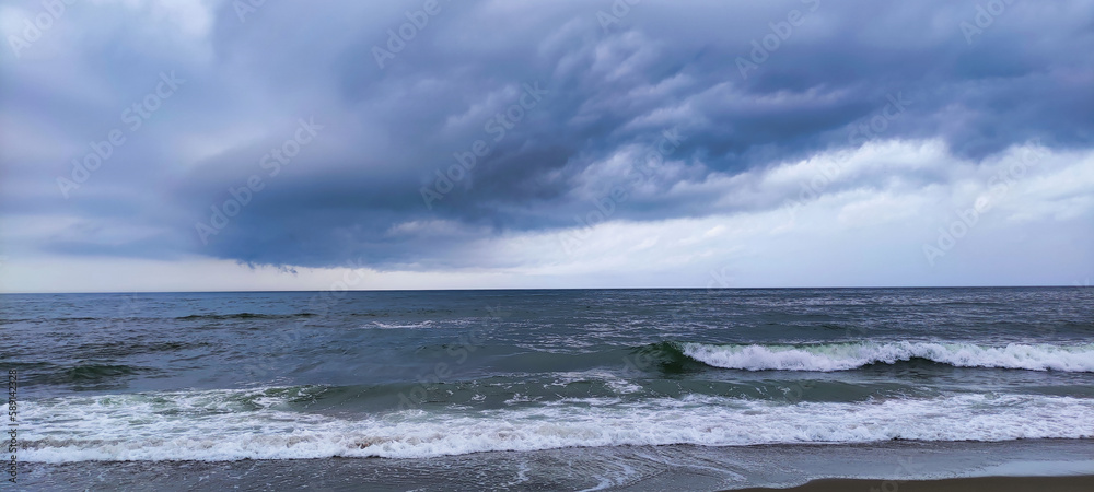 Waves in the Black Sea during a storm. Cloudy weather. Karolino-Bugaz. Ukraine. Europe