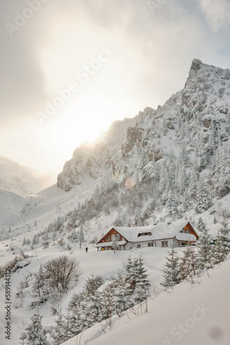 cabin in the winter mountains