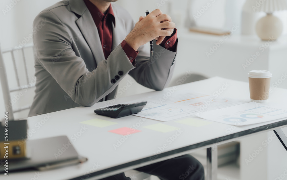 The financiers are calculating personal taxes for their customers. The financiers are calculating personal taxes for their customers.