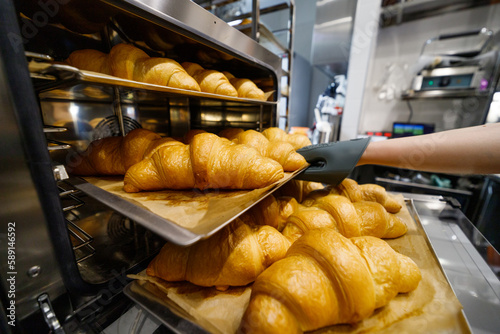 Fotografie Croissants straight from the oven after baking.