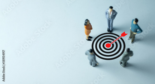 Teamwork, collaboration ,Goal Achievement and Purposefulness,Business concept.,A business group stand on right side photo and focus on Dartboard icon with copyspace.