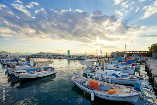 Harbor with leisure and fishing boats at anchor, Perdika, Egina Island, Greece.