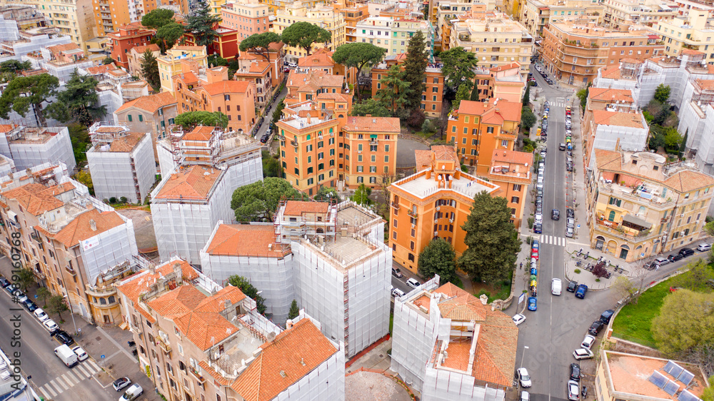 Aerial view of the Tiburtino district in Rome, Italy. It is a residential area with many buildings and trees.