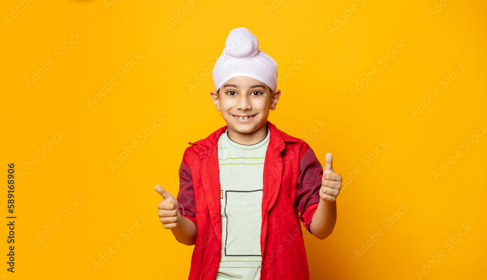happy indian sikh kid thumbs up  
