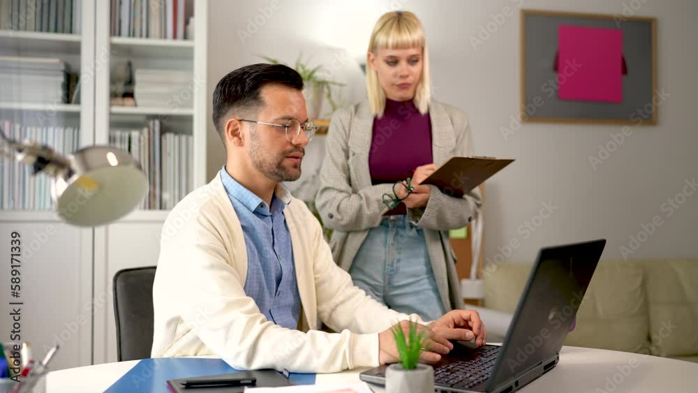 Couple who are managing to balance work and home life efficiently ...