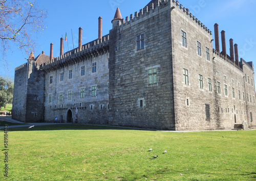 Guimarães Castle. Tourist destination in the District of Braga, Portugal. Medieval castle in the northern region of Portugal.  photo