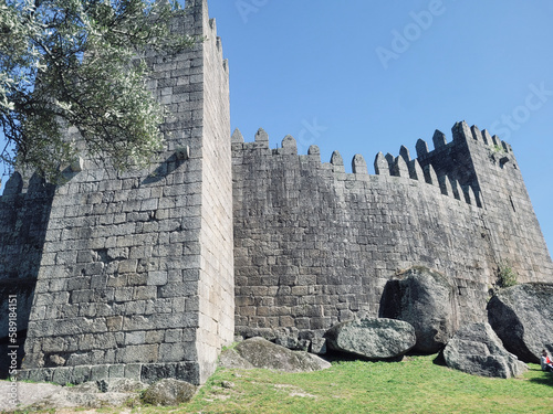 Guimarães Castle. Tourist destination in the District of Braga, Portugal. Medieval castle in the northern region of Portugal.  photo