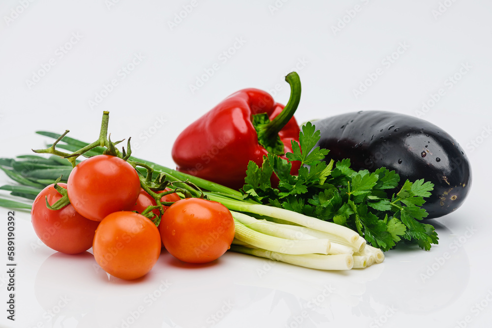 Various fresh vegetables isolated on white background.