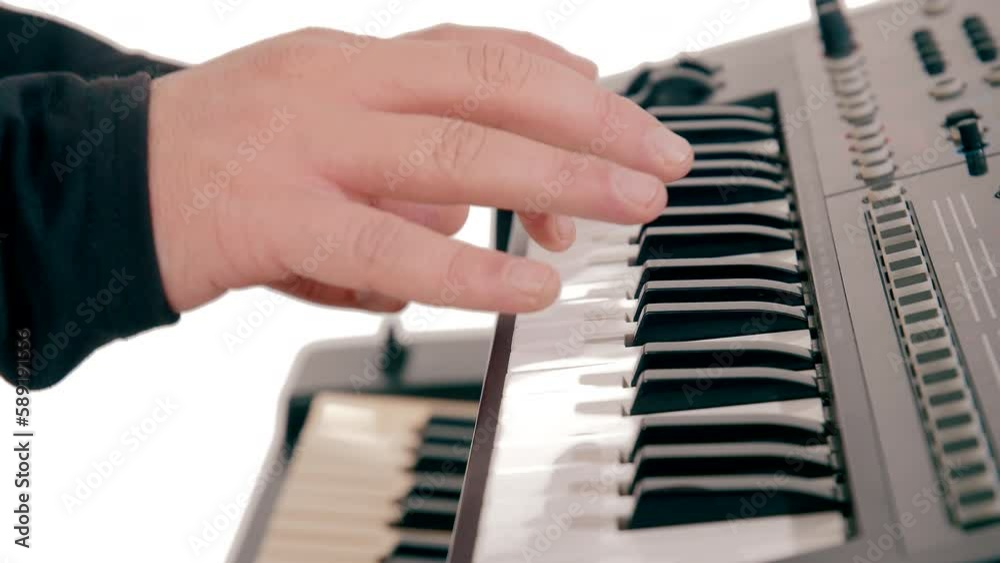 Handheld Shot Of Man Hand Playing Keyboard Handheld Shot Of Man Hand Playing Keyboard