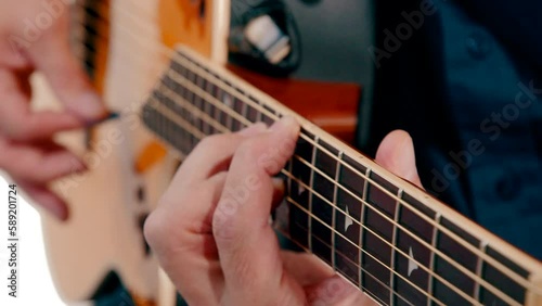 Handheld Shot Of A Man Playing Acoustic Guitar