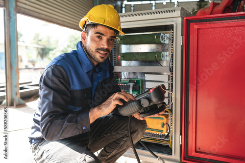 Young male engineer and wor...