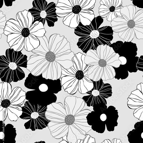 Seamless pattern of black and white flowers.