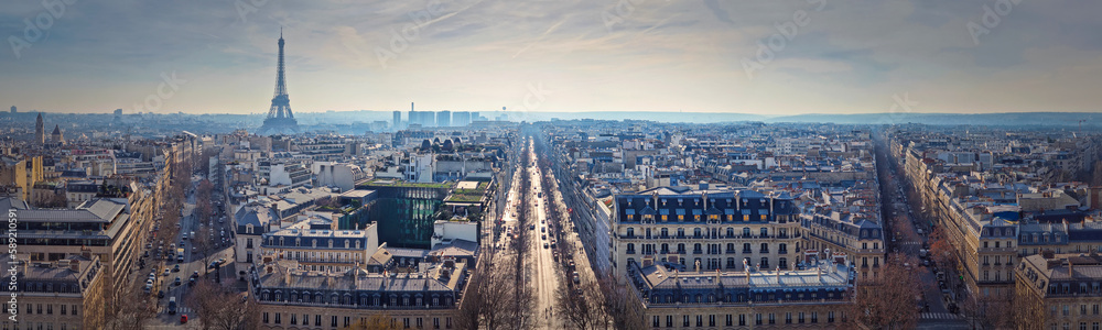 Paris cityscape panoramic view to the Eiffel Tower, France. Beautiful parisian architecture with historic buildings, landmarks and busy city streets
