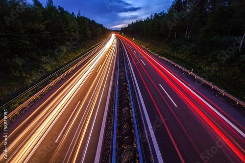 Long exposure of the lights of the cars on the road at sunset