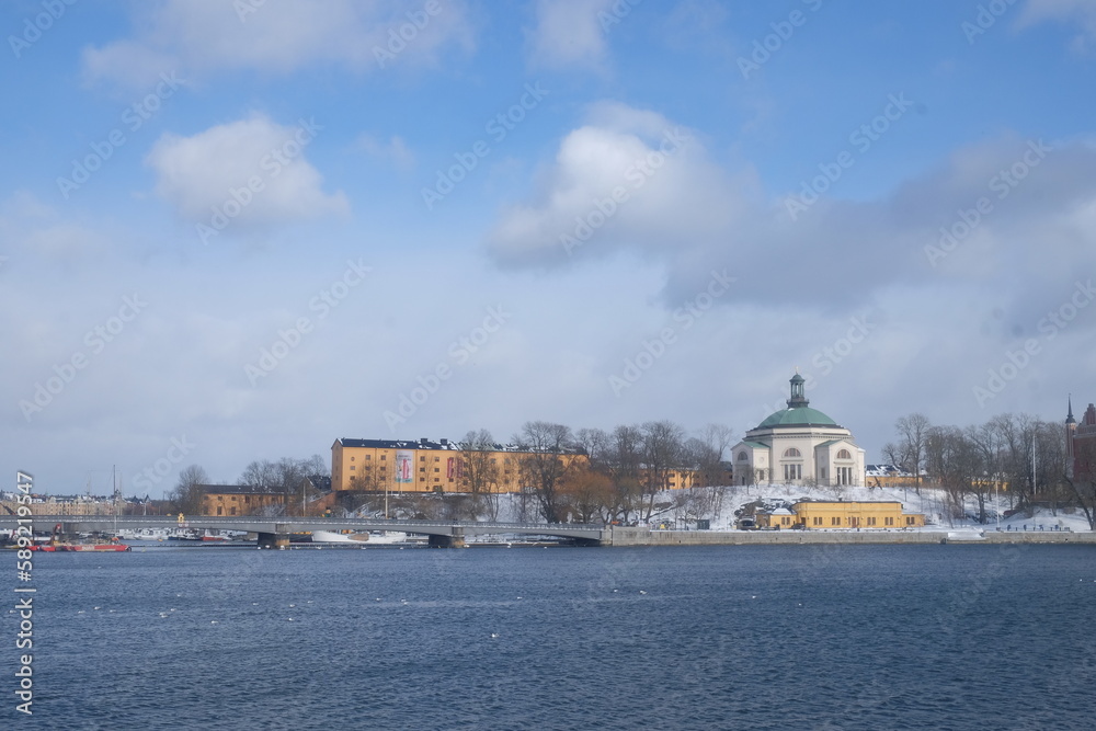 Stockholm bridge in sunshine across the sea