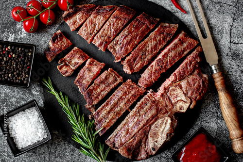 grilled T-bone steak on stone background