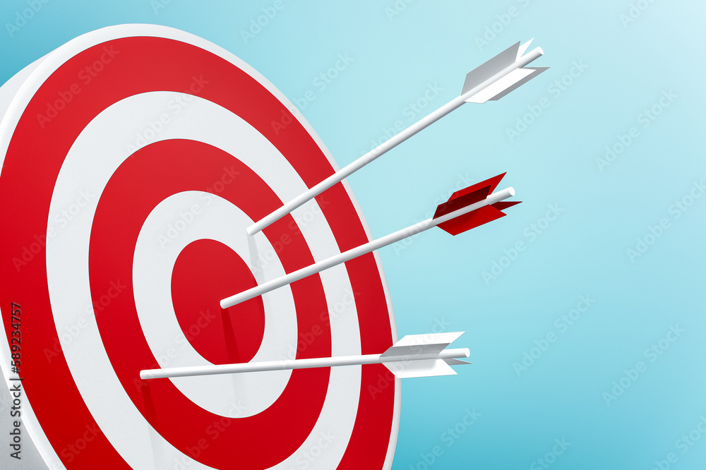 Round shaped target with arrow on blue background