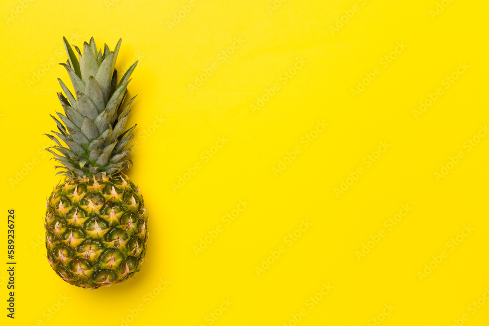 Fresh pineapple on color background, top view Fresh pineapple on color background, top view
