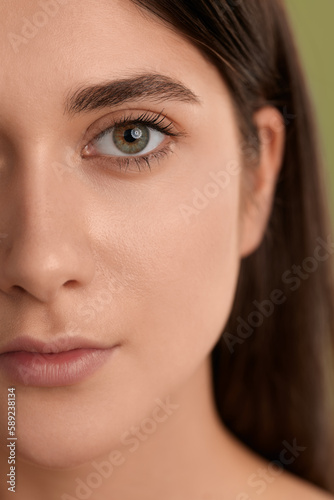 Half female face with perfect clean skin