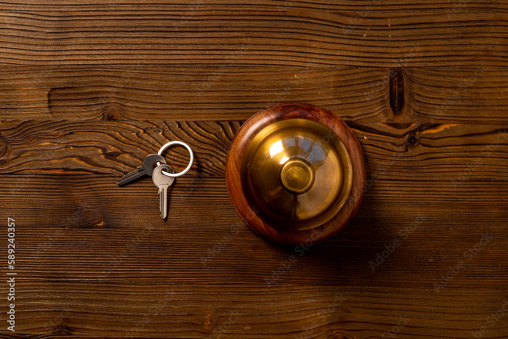 Hotel service bell with keys. Booking and checkin concept Hotel service bell with keys. Booking and checkin concept