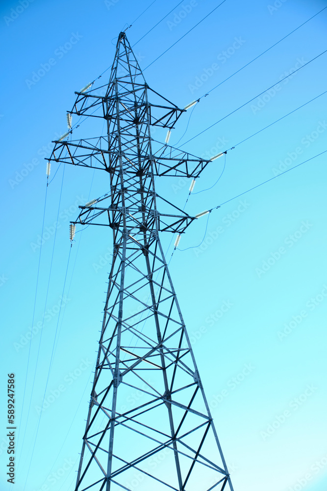 Metal support power line against blue sky. Metal support power line against blue sky.