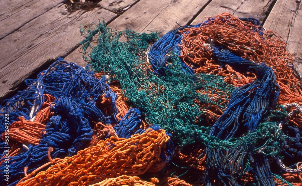 Colorful Fishing Nets on Wooden Wharf