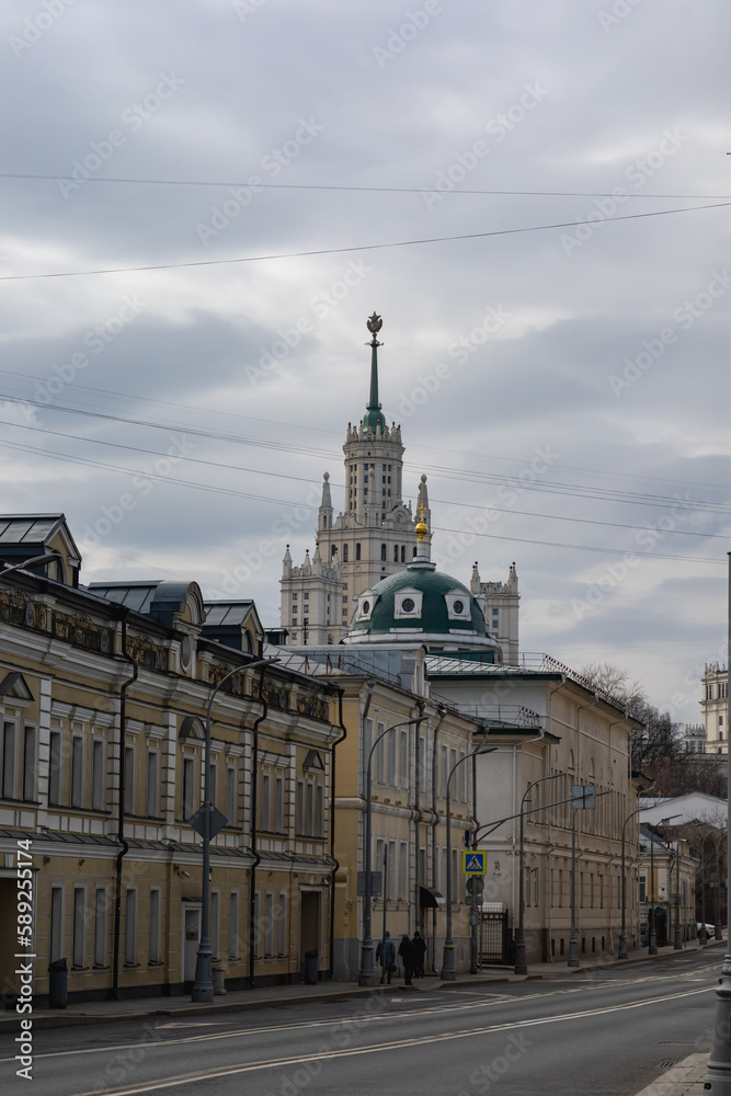 Nikoloyamskaya street in Moscow, view of the Stalin skyscraper and the Church of Simeon the Stylite beyond the Yauza