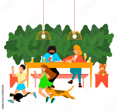 dia-a-dia inclusivo - Família feliz fazendo um lanche de tapioca à mesa enquanto as crianças brincam com o cachorro ao redor - Dia das Mães
