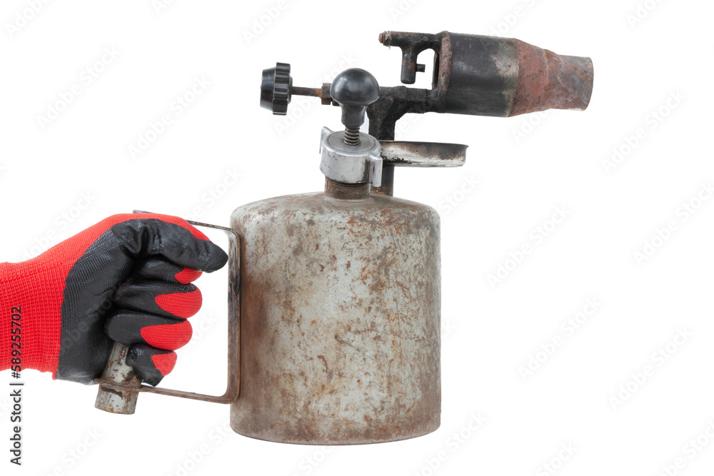 blowtorch in worker's hand, old, rusty, isolated
