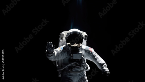astronaut floating in space, world UFO day concept, copy space for text (created with Generative AI)