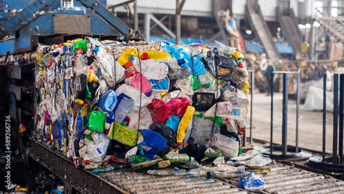 Fotografie Compressed plastic garbage at waste sorting plant