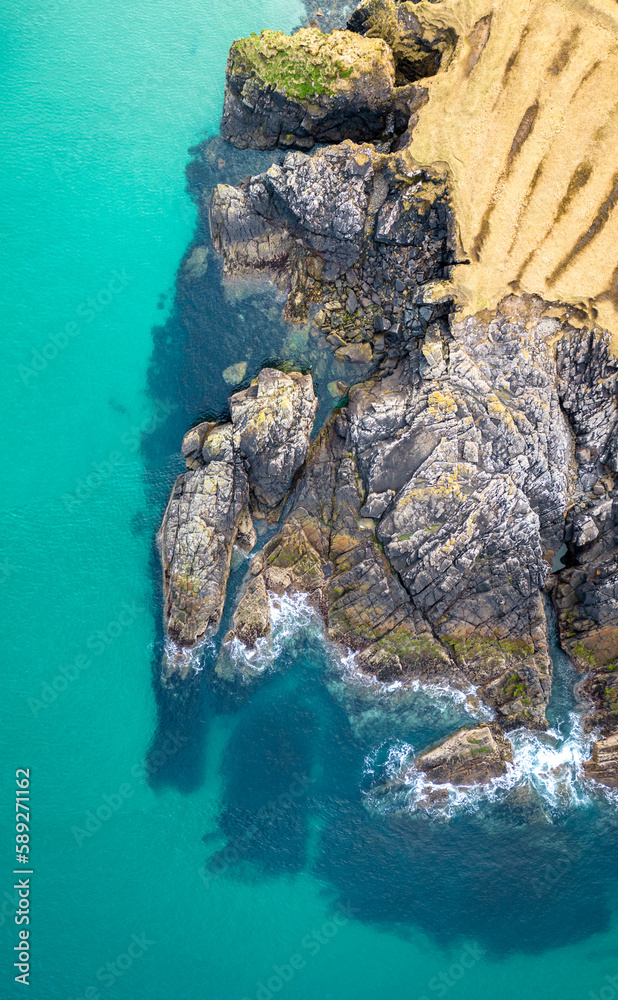 Aerial drone view of Port of Stoth on the Isle of Lewis. Turquoise sea water.