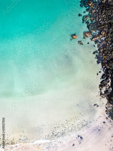 Aerial drone view of Port of Stoth on the Isle of Lewis. Turquoise sea water.