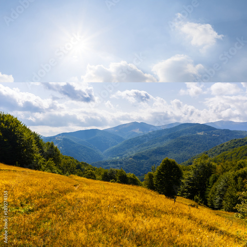 summer mountain chain under a cloudy sky with sparkle sun