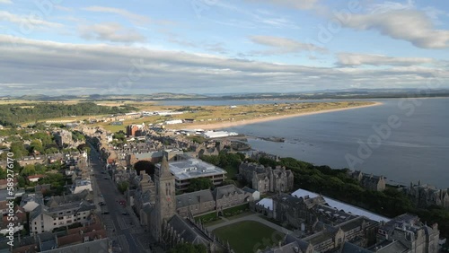 Aerial view of St Andrews in Scotland with a golf course background photo