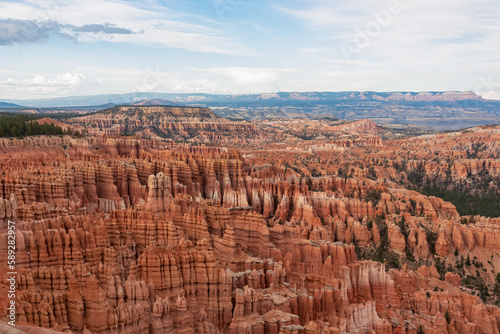 Panoramic aerial view of massive hoodoo sandstone rock formations in Bryce Canyon National Park, Utah, USA. Natural unique amphitheatre sculpted from the reddest rock of the Claron Formation. Awe © Chris