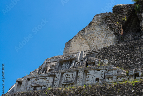 Mayan temple symbols closeup in Belize photo
