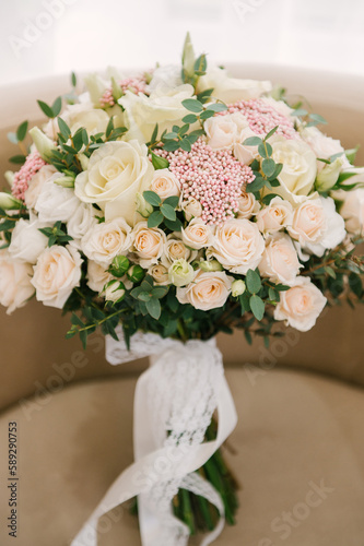 Beautiful bridal bouquet of white roses © ksyusha_yanovich