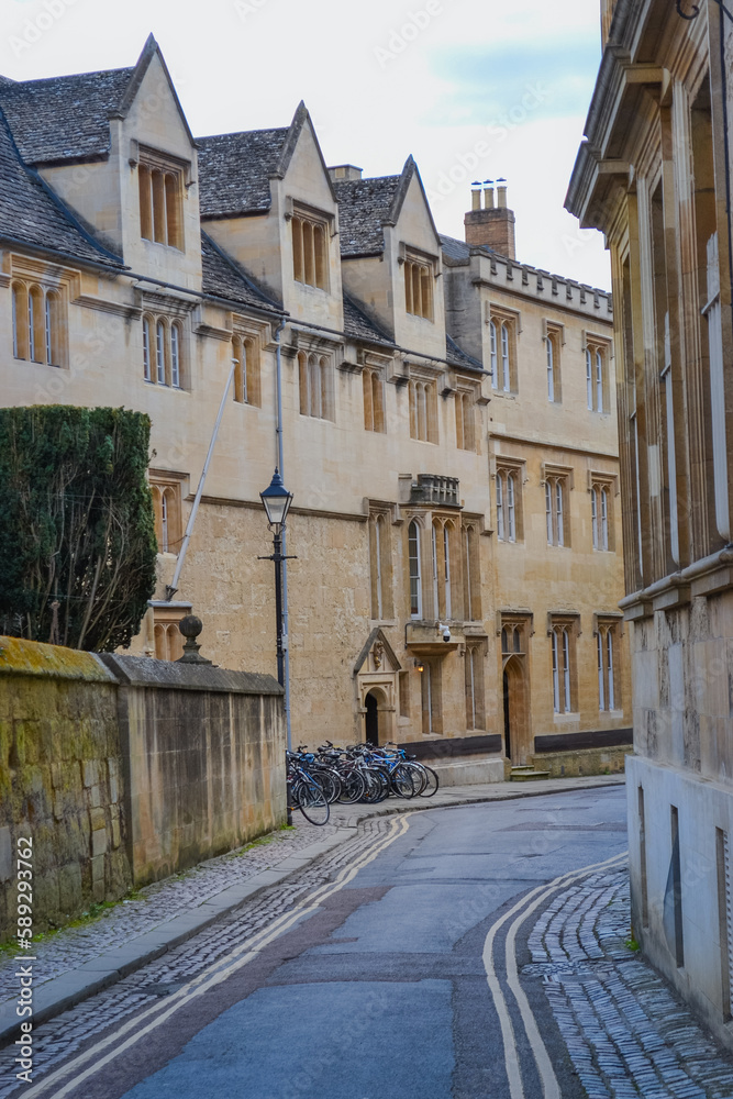 UK, Oxford, 23.03.2023: City of Oxford, and the view to its streets with old stone made buildings and medieval architecture.