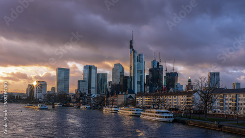 Frankfurt am Main, Germany, a sun star in the city skyline in the evening hours © Margitta